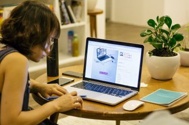 woman browsing on her laptop